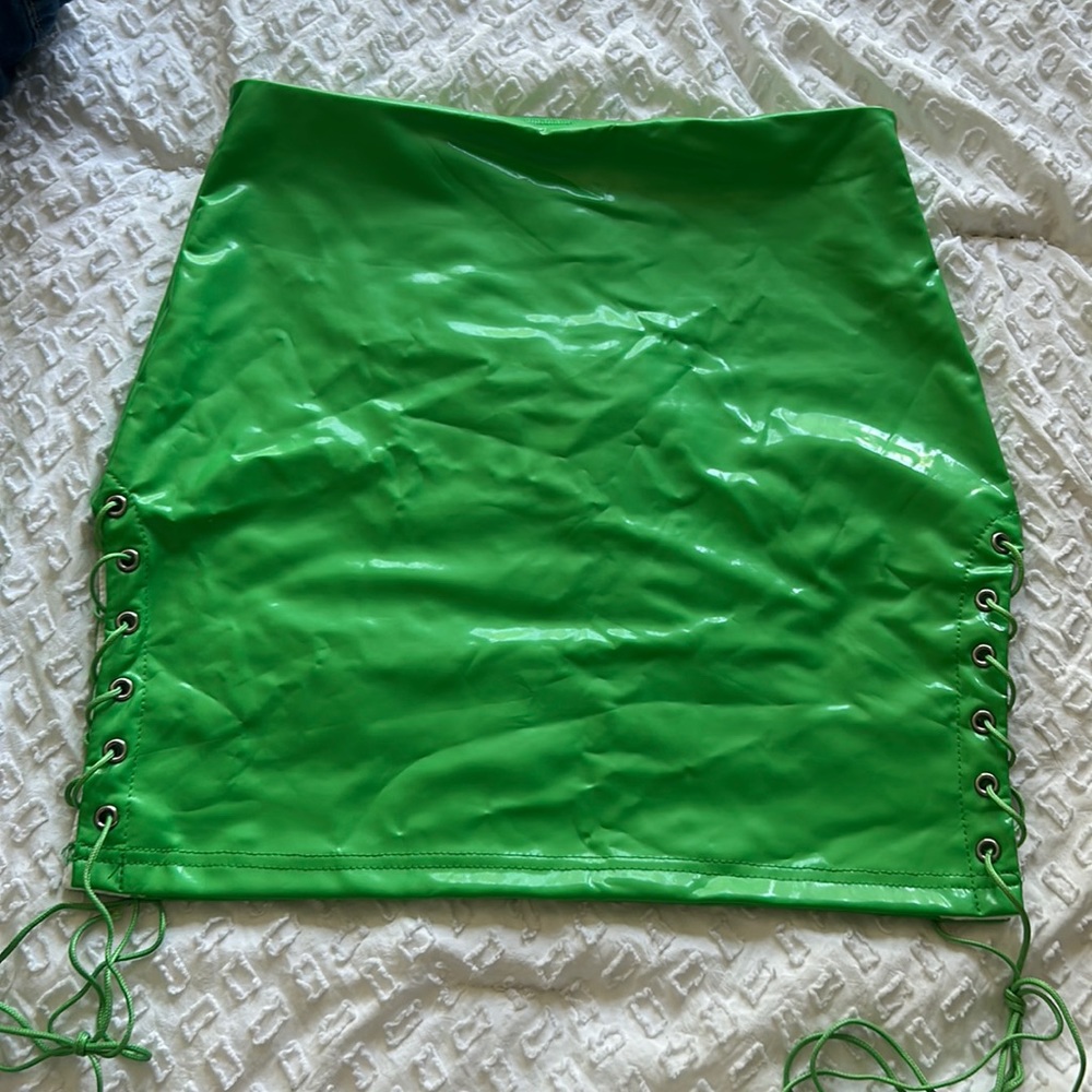 Leather like green skirt with slits on each side